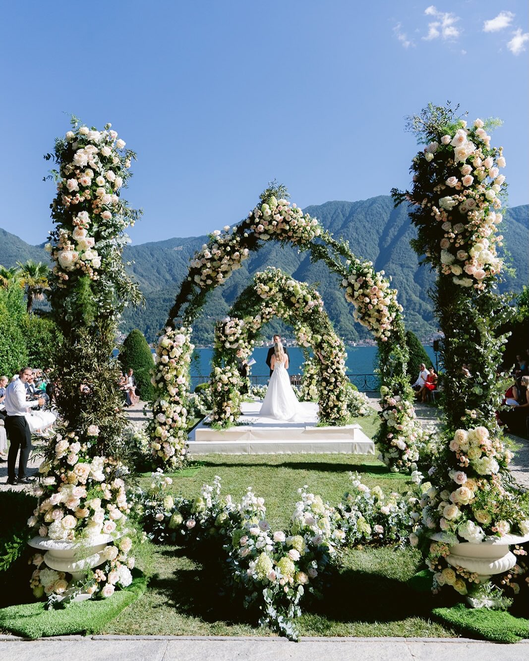 Bride and groom during a lakeside ceremony